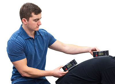 Therapist using Baseline Digital Inclinometer for Spine ROM